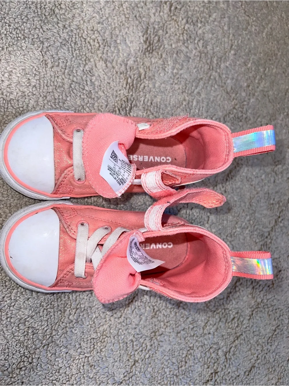 Sparkle Every Step! ✨ Pink Shimmer Converse High Tops.